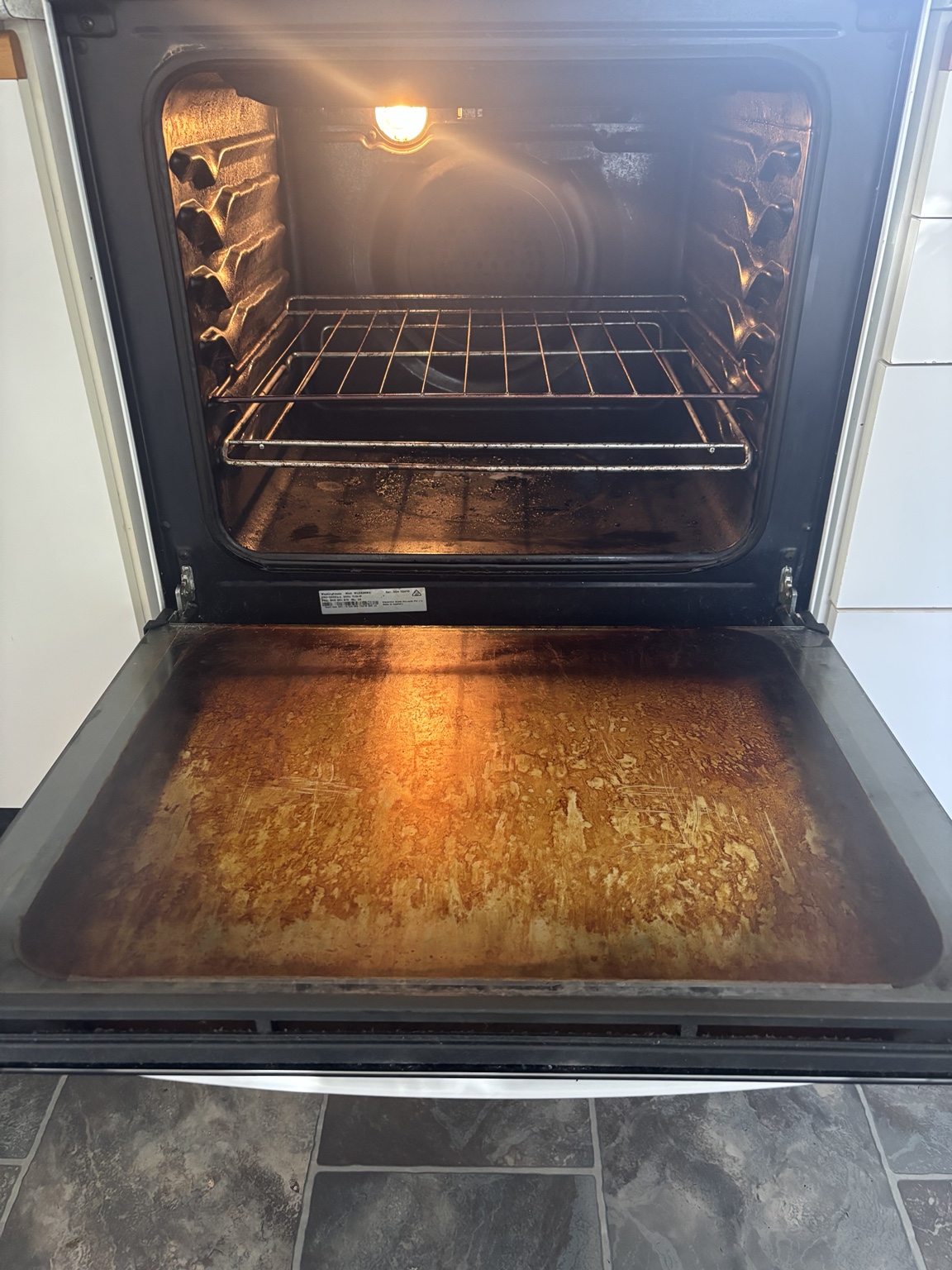 Heavily soiled oven before detailed cleaning