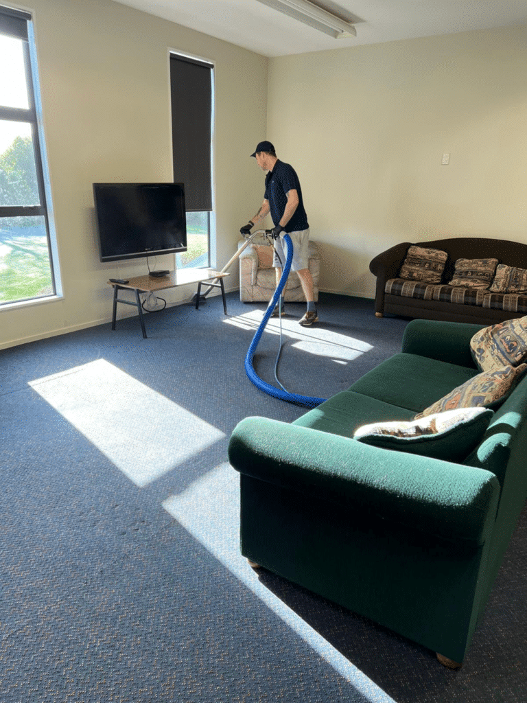 Professional carpet cleaning in Christchurch showing hot water extraction cleaning